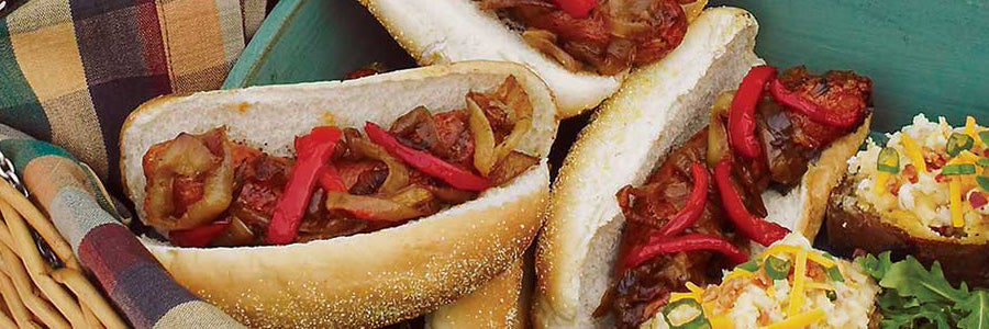 HOT DOGS WITH CARAMELISED ONIONS AND PEPPERS
